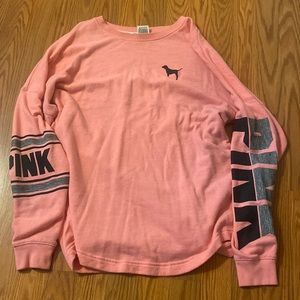 Long sleeved, crew neck shirt